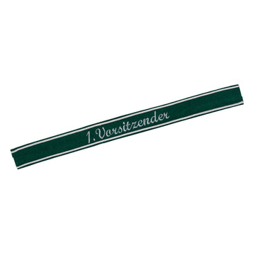 Verein Ärmelband / Ärmelstreifen " 1. Vorsitzender " in silber auf dunkelgrünem Filz
